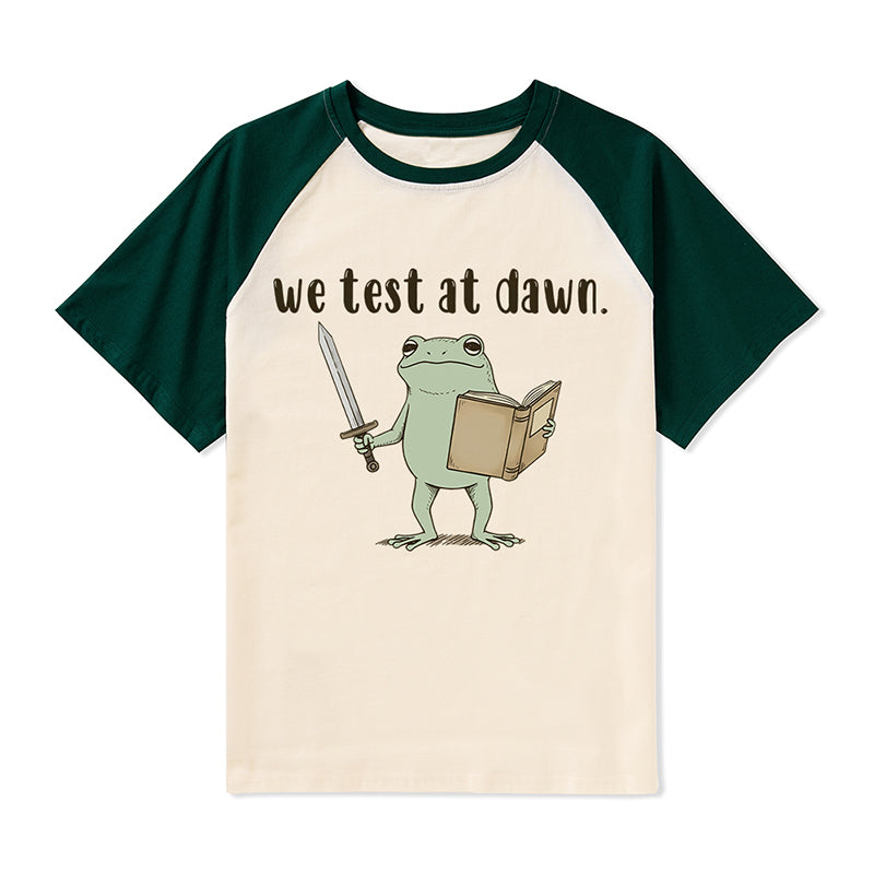 We Test At Dawn Teacher Raglan T-Shirt